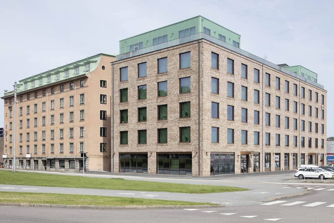 Exteriörbild av den färdigställda fastigheten.