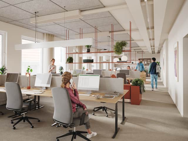 Personer arbetar på kontor