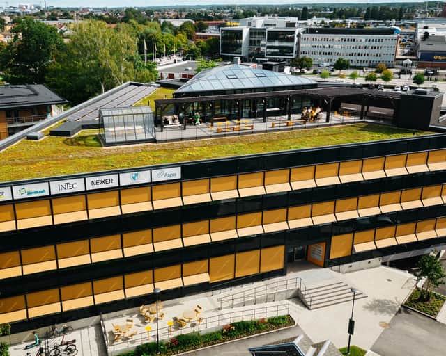 Visionsbild av fastigheten.