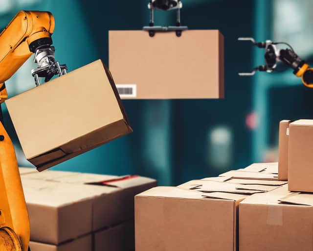 Robotar griper i paket