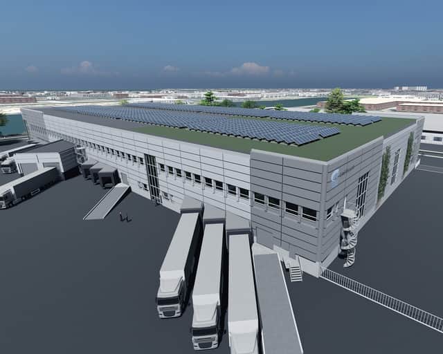 Visionsbild av fastigheten med solceller på taket.